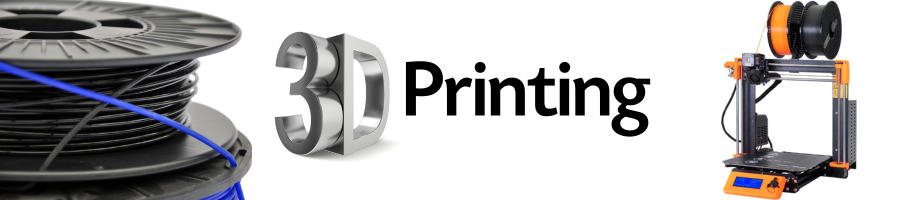 Roll of black filament; orange and blue Prusa MK3S 3D Printer